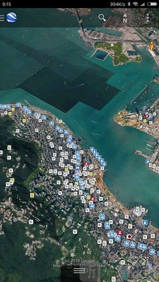 谷歌地球选择地点并双指缩放地图操作界面